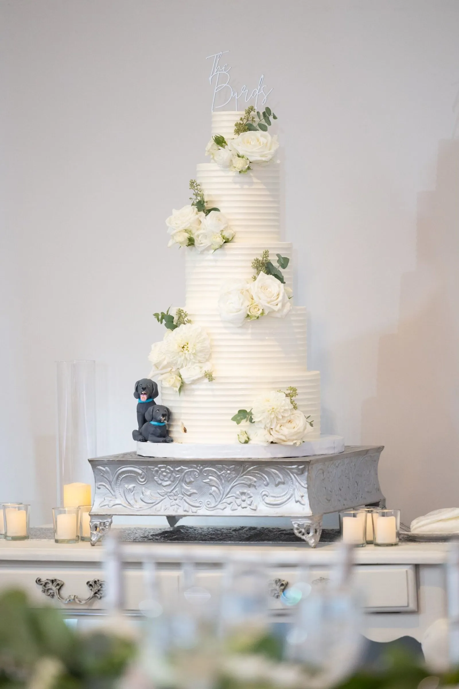 White tiered wedding cake by Cakes by Iz