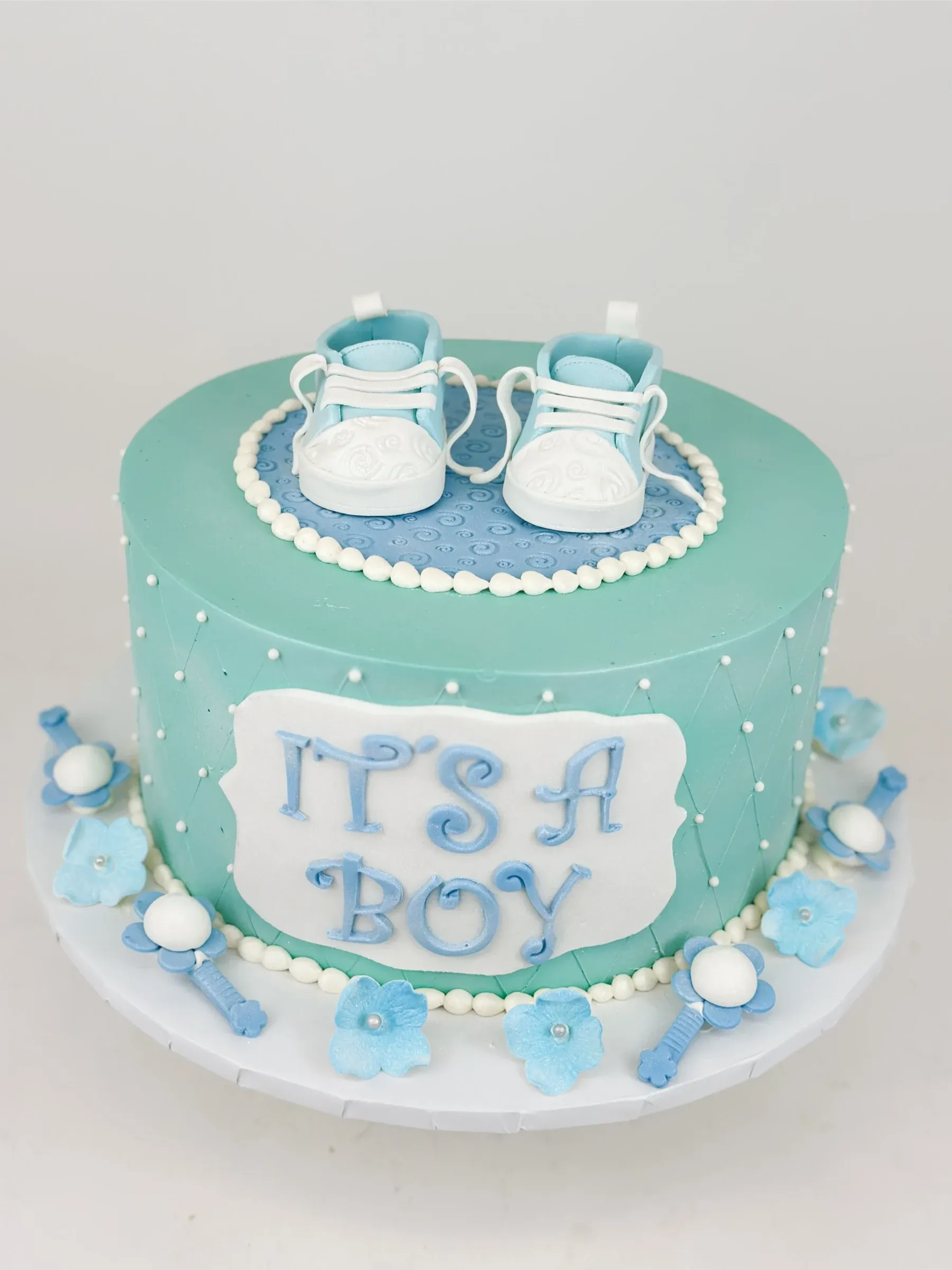 Custom gender reveal cake by Cakes by Iz