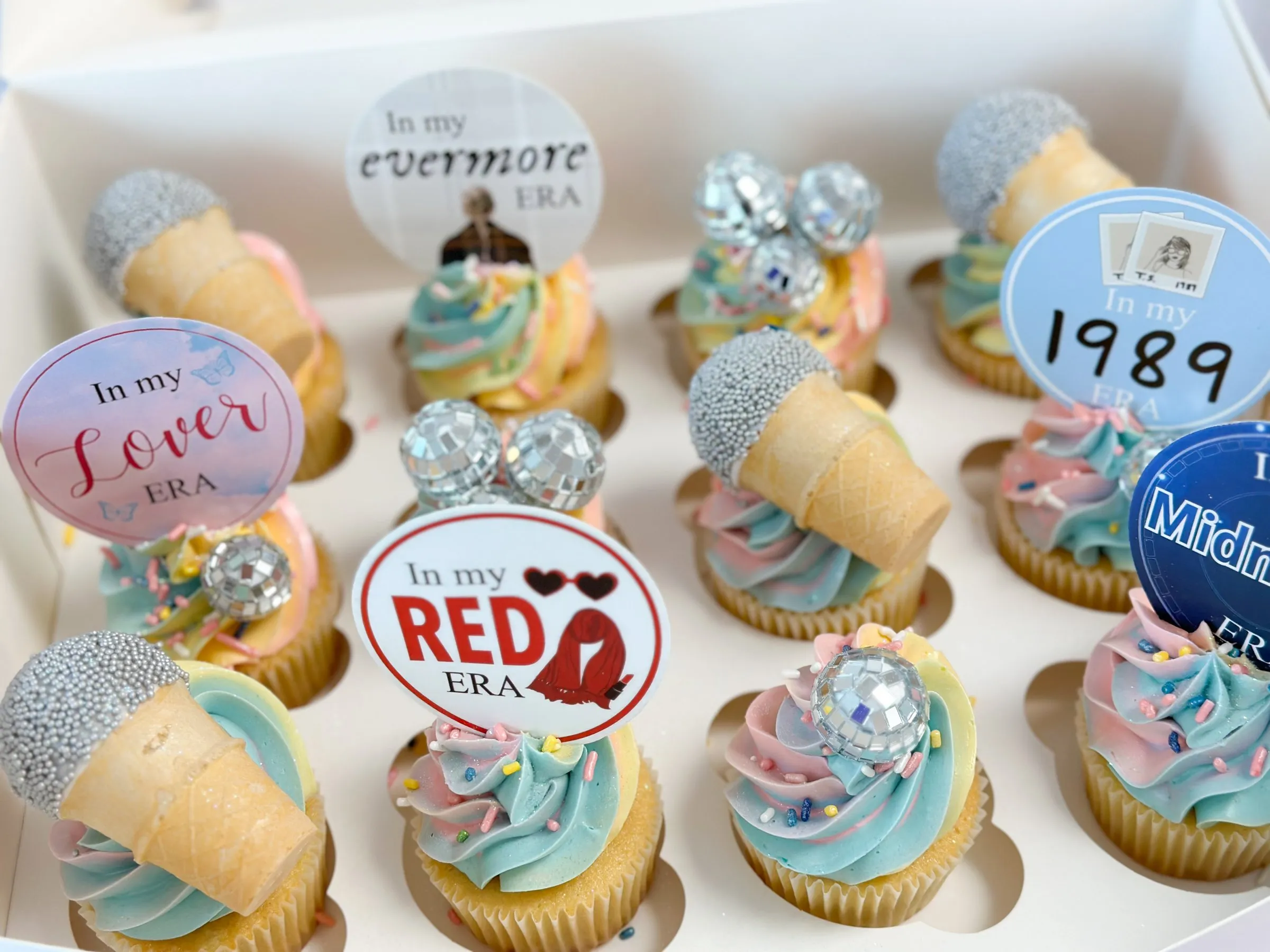 Custom cupcakes by Cakes by Iz