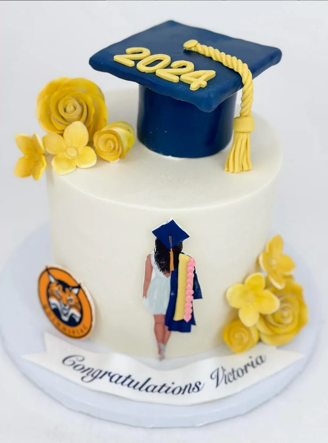 Custom graduation cake by Cakes by Iz